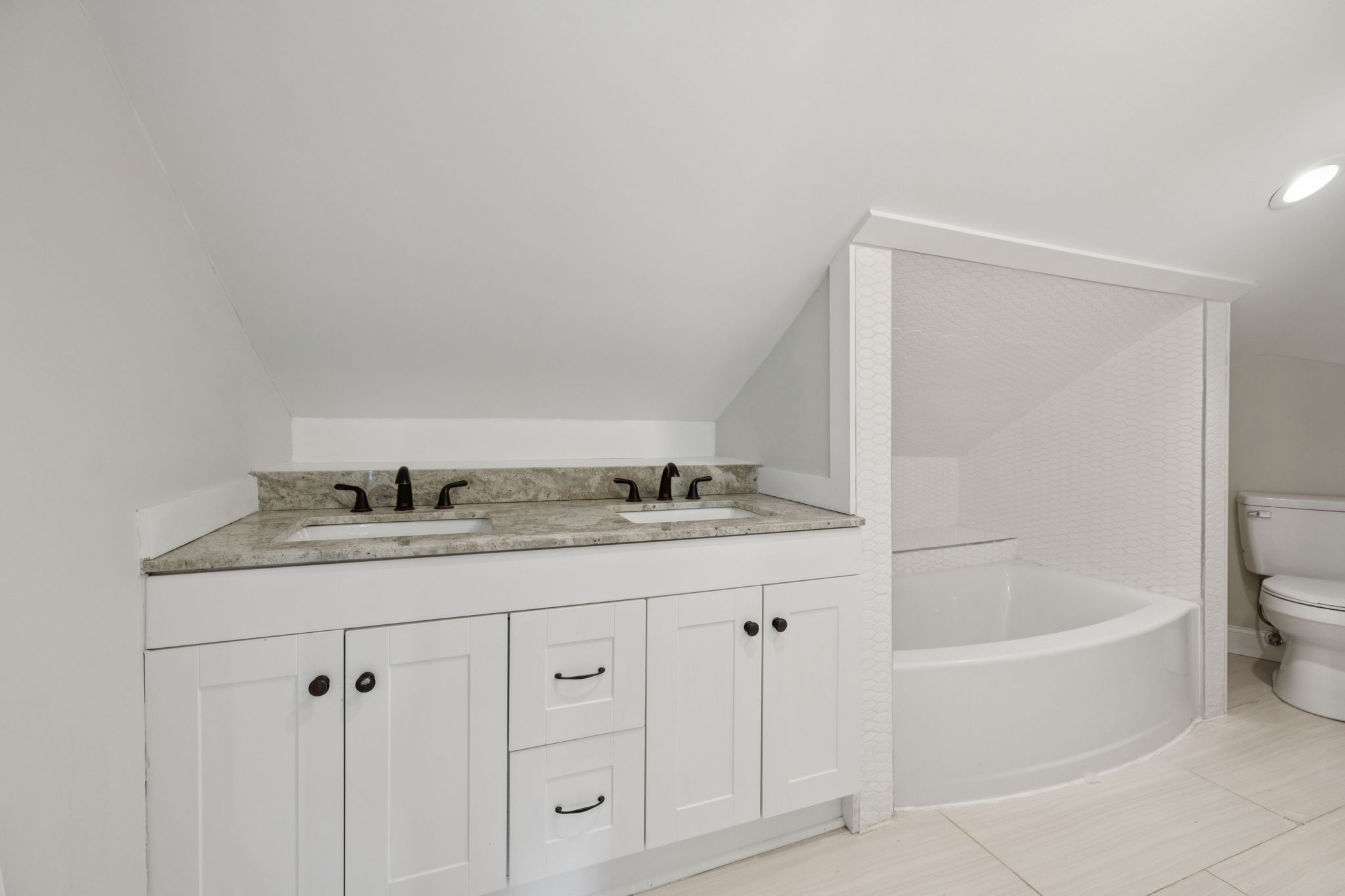 511 North Main Street Morrison, TN 37357 - Photo 26 of 41 a bathroom with a granite countertop sink a toilet and bathtub