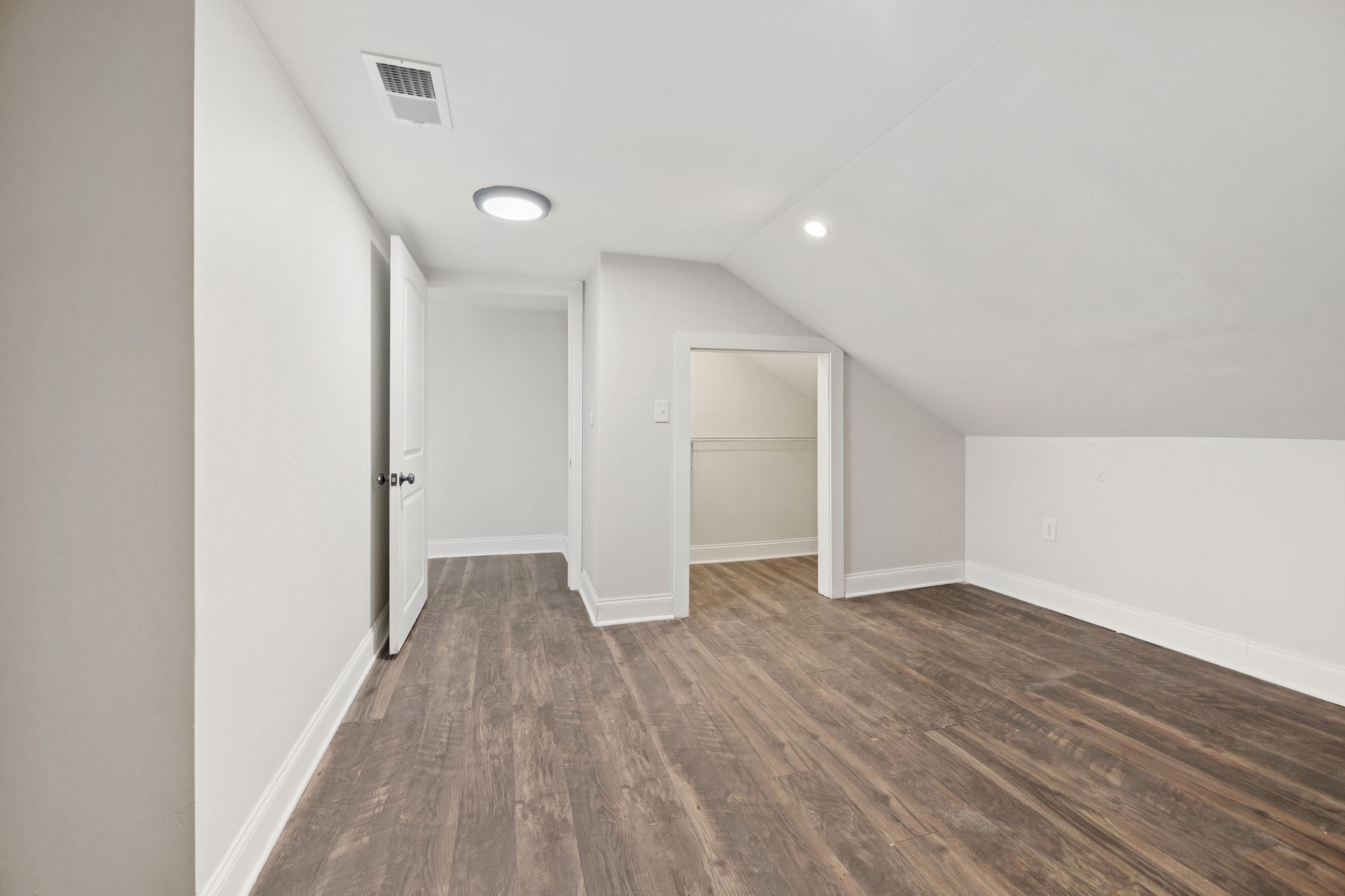 511 North Main Street Morrison, TN 37357 - Photo 27 of 38 a view of an empty room with wooden floor