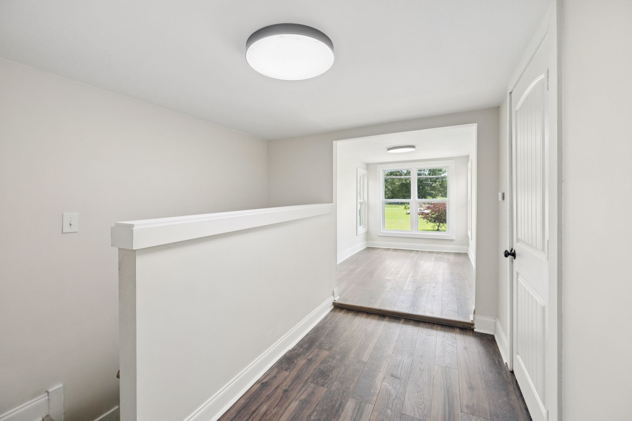 511 North Main Street Morrison, TN 37357 - Photo 31 of 41 a view of an empty room with wooden floor and a window