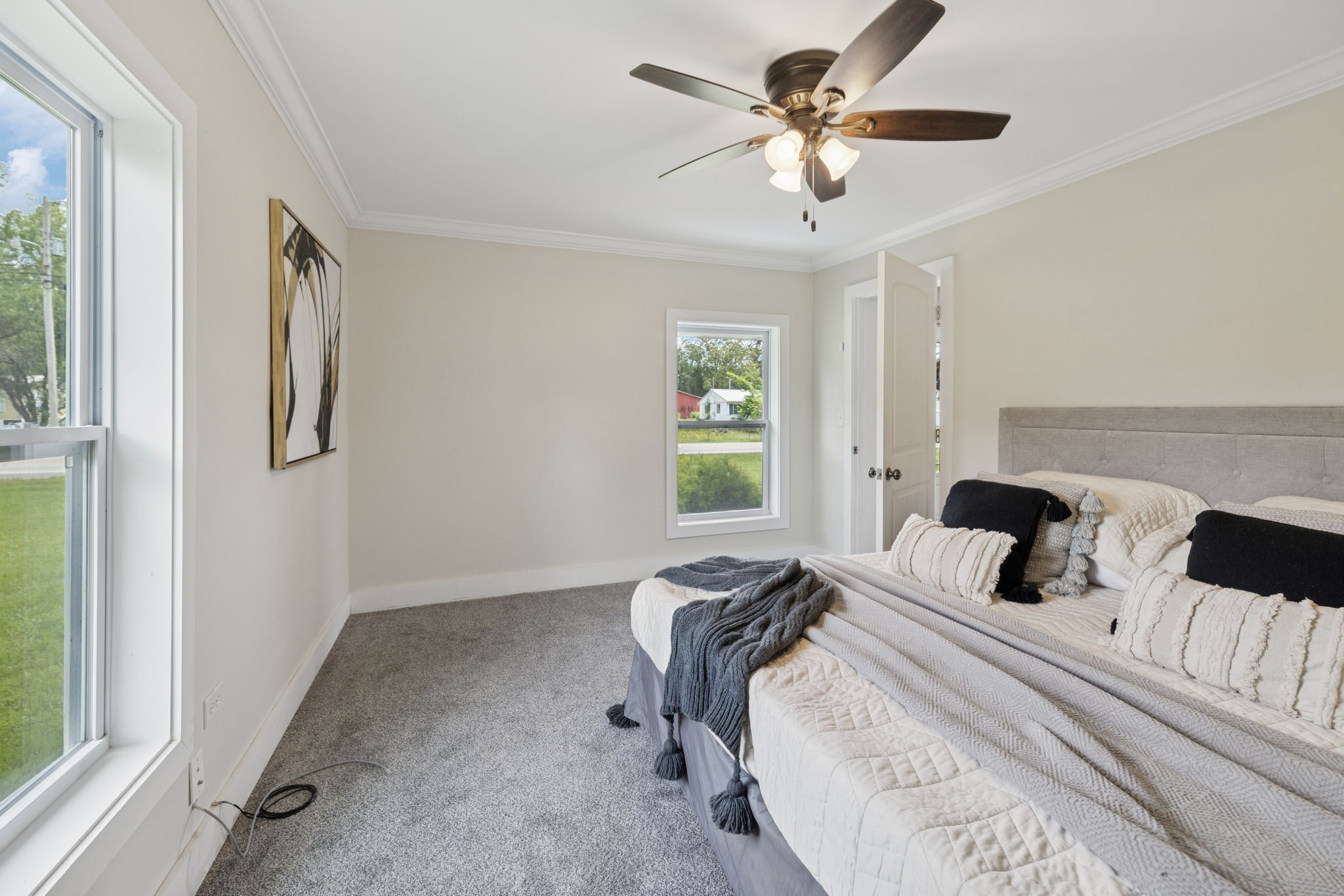 511 North Main Street Morrison, TN 37357 - Photo 10 of 38 a bedroom with a bed and a chandelier