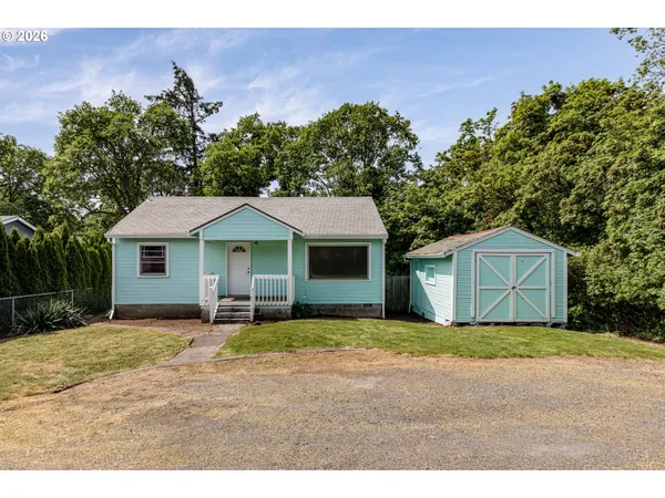 a house with yard in front of it