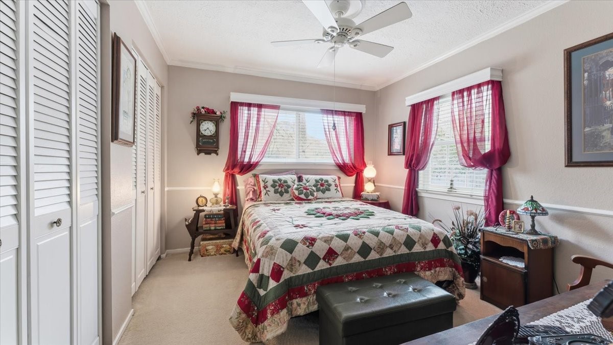 18 Still Glen Court Spring, TX 77381 - Photo 23 of 40 Upstairs we have the fist bedroom with double closets that would serve your family well.