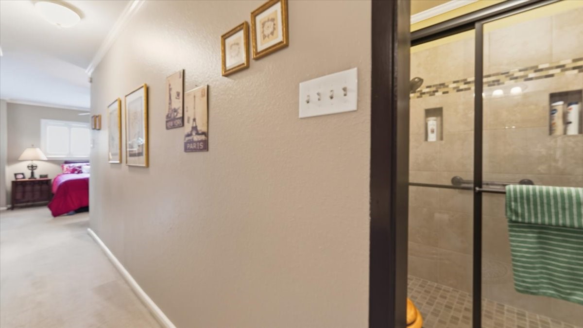 18 Still Glen Court Spring, TX 77381 - Photo 26 of 40 The primary has a walk-in shower with sliding doors