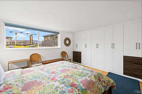 a bathroom with a shower sink vanity and mirror