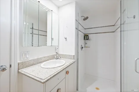 a view of a hallway with washer and dryer