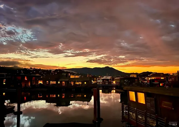 a view of a chairs and table in a room