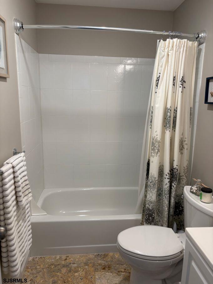 167 40th Street South, Unit 2 Brigantine, NJ 08203 - Photo 21 of 28 a bathroom with a toilet and a bathtub