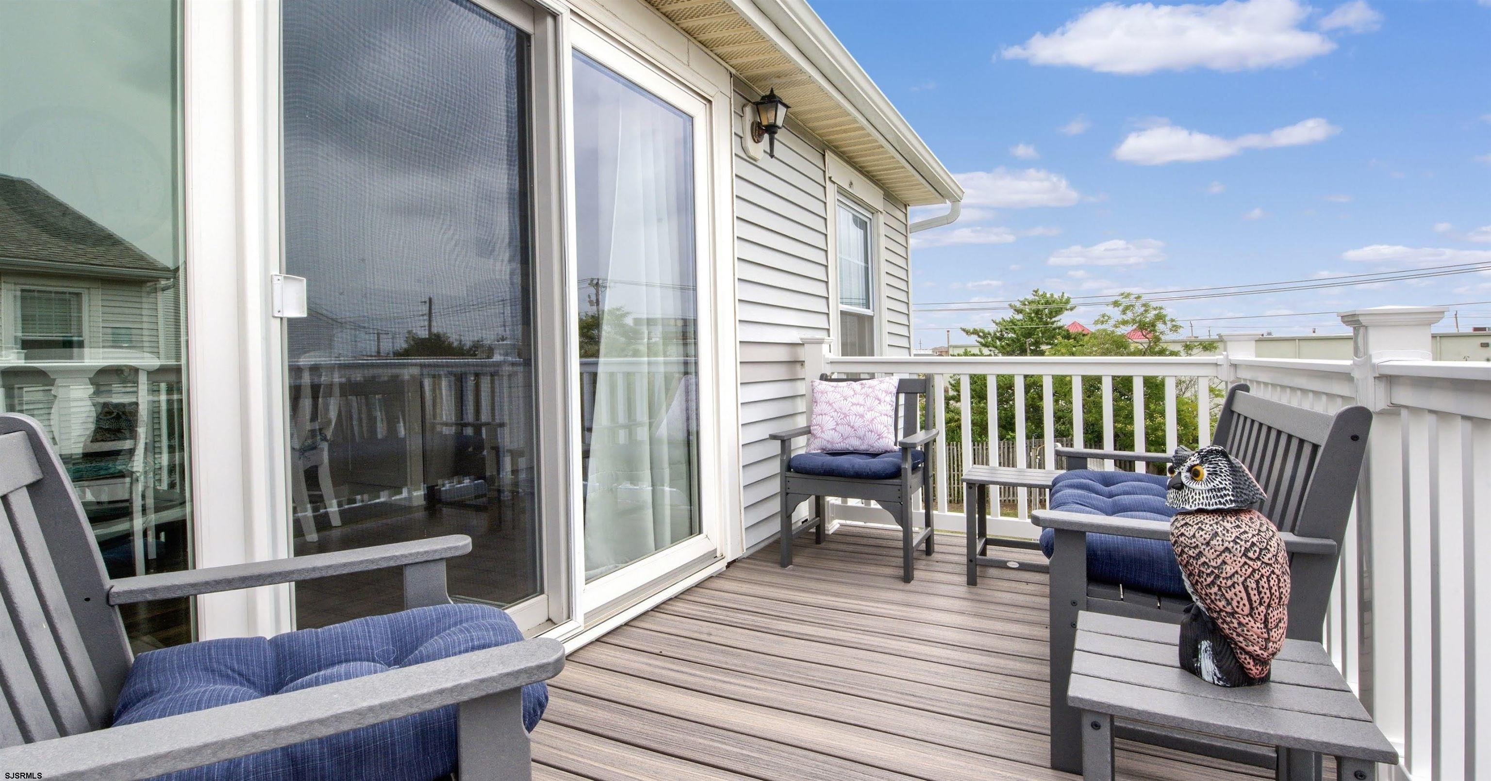 167 40th Street South, Unit 2 Brigantine, NJ 08203 - Photo 22 of 28 a view of a deck with furniture