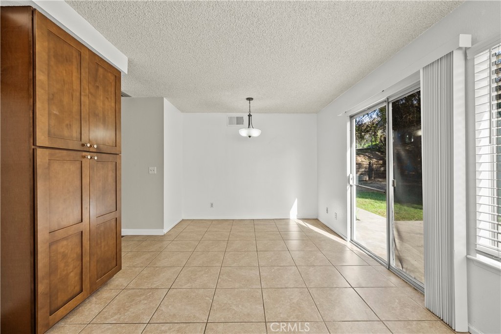 30008 Abelia Road Canyon Country, CA 91387 - Photo 12 of 32 a view of an empty room with a window