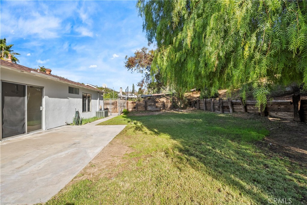 30008 Abelia Road Canyon Country, CA 91387 - Photo 25 of 32 a view of a backyard with sitting area