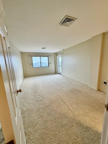 a view of a livingroom with a staircase
