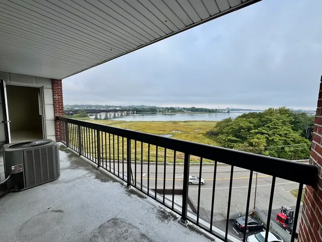 a view of balcony with furniture