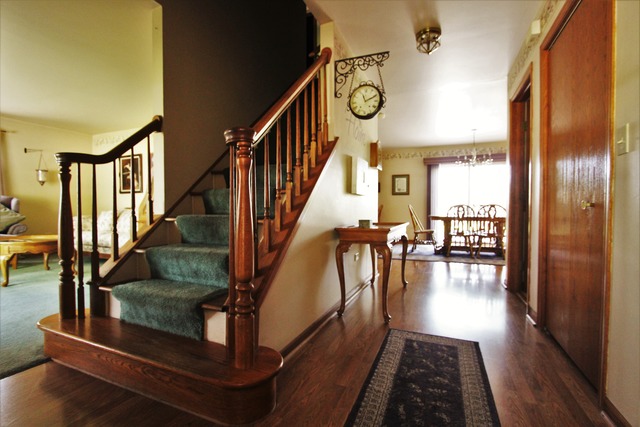 235 Grandin Road Morris, IL 60450 - Photo 2 of 20 a view of entryway and hall with wooden floor