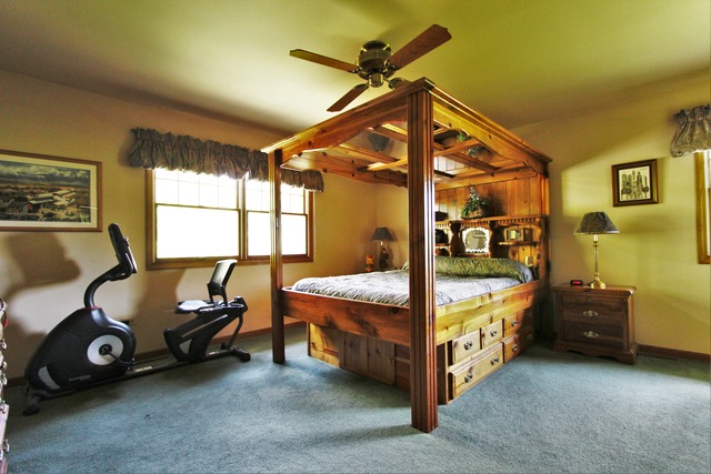 235 Grandin Road Morris, IL 60450 - Photo 12 of 20 a bedroom with a bed and a window