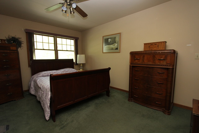 235 Grandin Road Morris, IL 60450 - Photo 14 of 20 a bedroom with a bed and a window