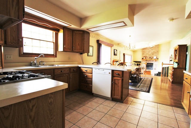 235 Grandin Road Morris, IL 60450 - Photo 6 of 20 a kitchen with a sink appliances and cabinets
