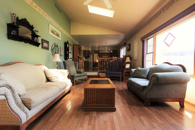 235 Grandin Road Morris, IL 60450 - Photo 9 of 20 a living room with furniture and a wooden floor