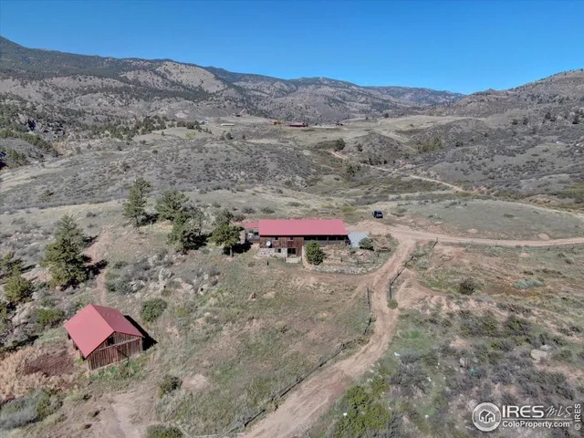 a view of a backyard with mountain view and mountain view