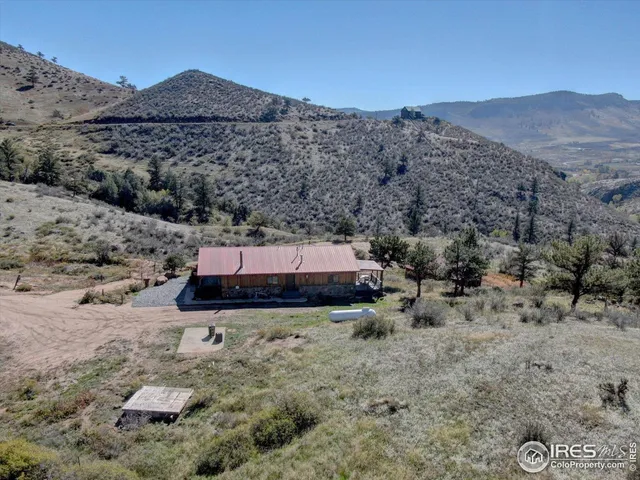 a view of a mountain with a mountain