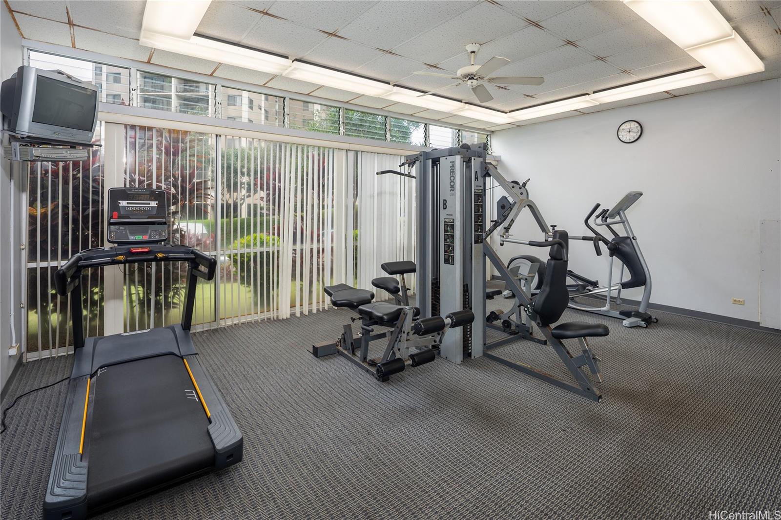 98-450 Koauka Loop, Unit 1108 Aiea, HI 96701 - Photo 16 of 22 a view of a room with gym equipment