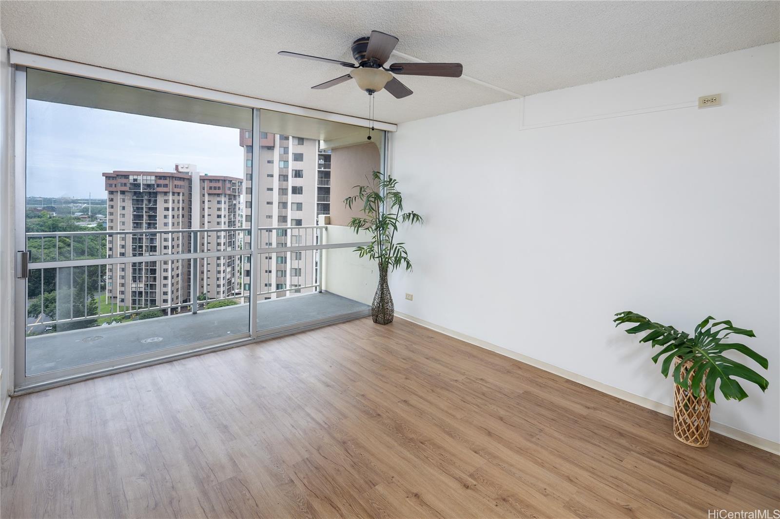 98-450 Koauka Loop, Unit 1108 Aiea, HI 96701 - Photo 2 of 22 a view of entryway with wooden floor