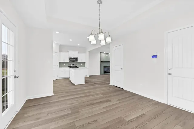 a bathroom with a sink a mirror and a toilet