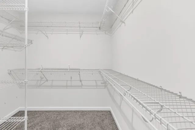 a bathroom with a sink a mirror a toilet and a bathtub