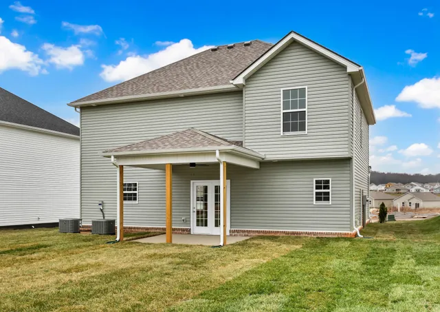 a view of a house with a big yard