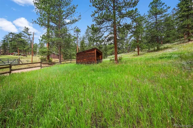 a backyard of a house with lots of green space