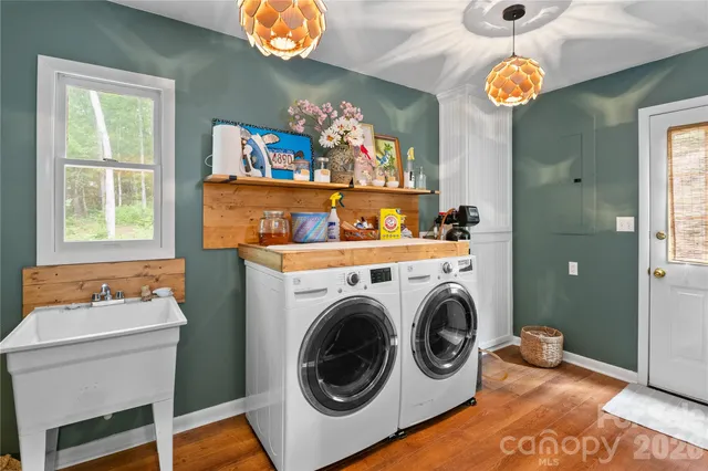 a utility room with dryer and washer