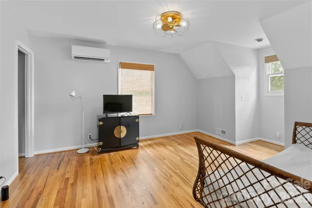 a view of a livingroom with wooden floor