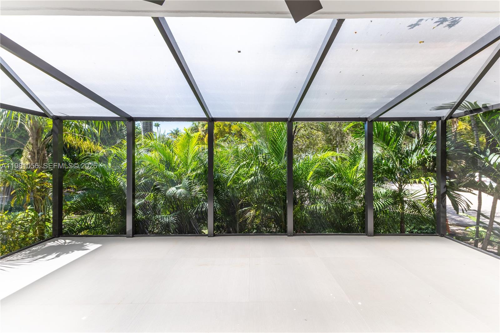 101 Ocean Ln Drive, Unit 1013 Key Biscayne, FL 33149 - Photo 16 of 28 a view of a room with large trees