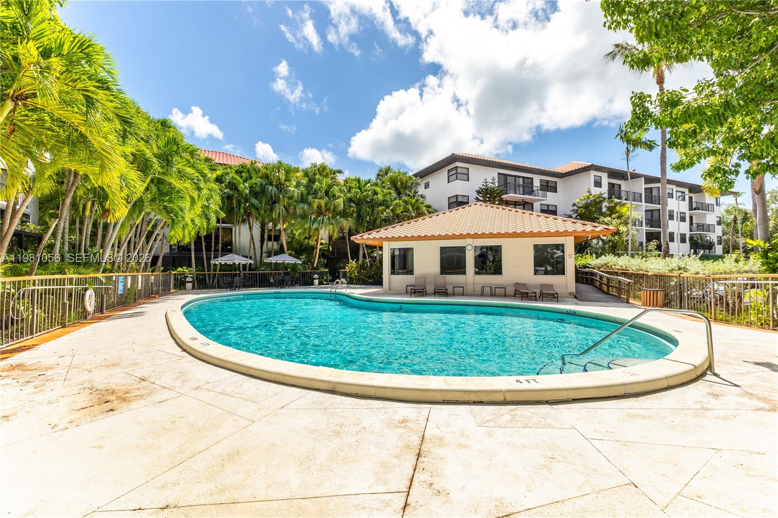 101 Ocean Ln Drive, Unit 1013 Key Biscayne, FL 33149 - Photo 19 of 28 a front view of a house with a yard