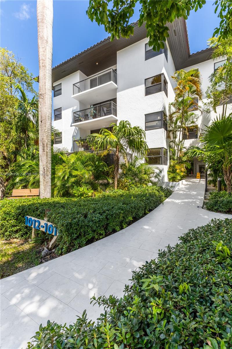 101 Ocean Ln Drive, Unit 1013 Key Biscayne, FL 33149 - Photo 2 of 28 a view of a garden with a pathway