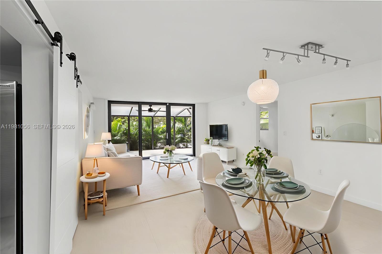 101 Ocean Ln Drive, Unit 1013 Key Biscayne, FL 33149 - Photo 6 of 28 a living room with furniture and a window