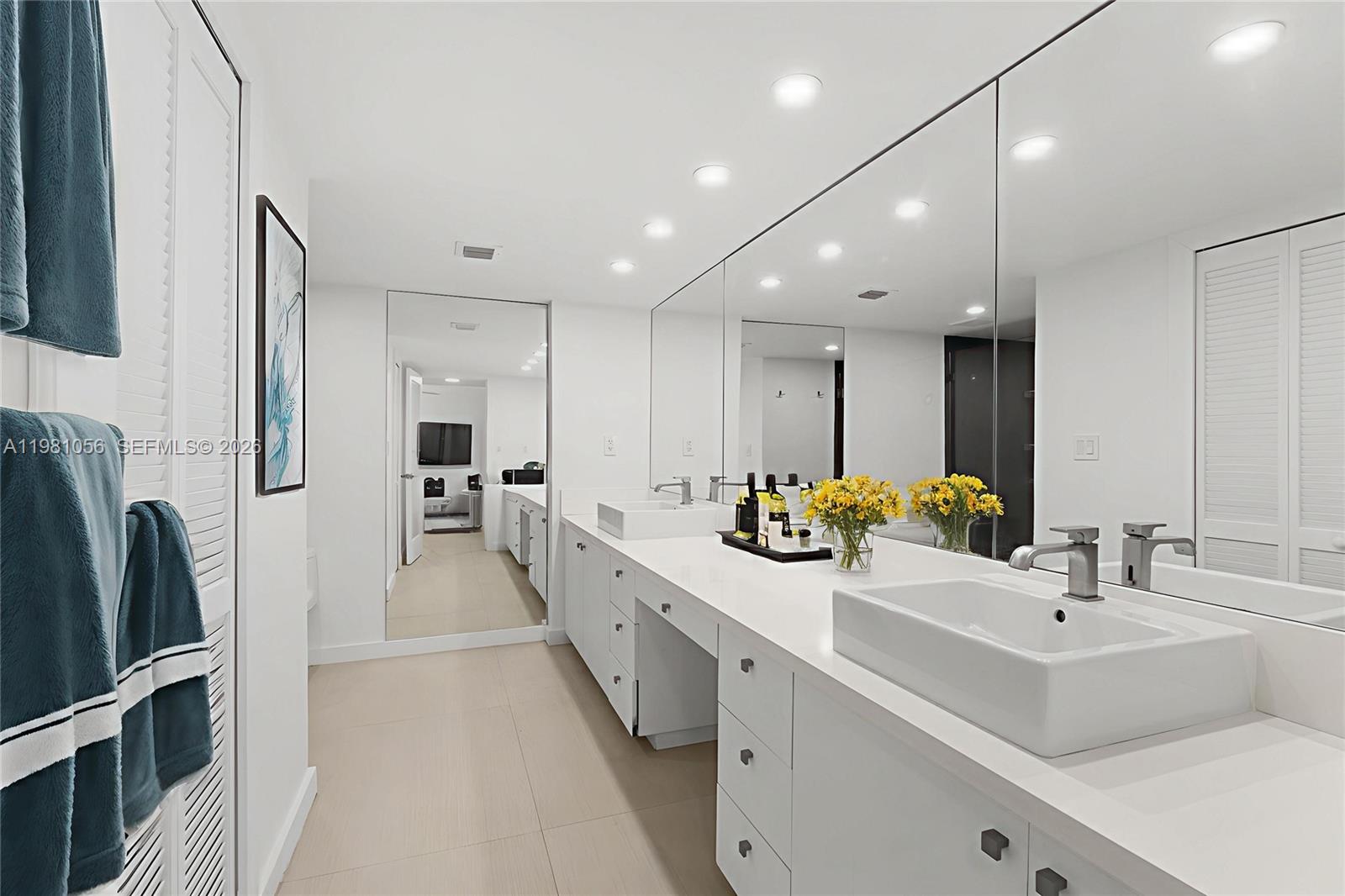 101 Ocean Ln Drive, Unit 1013 Key Biscayne, FL 33149 - Photo 10 of 28 a kitchen with counter top space sink and refrigerator