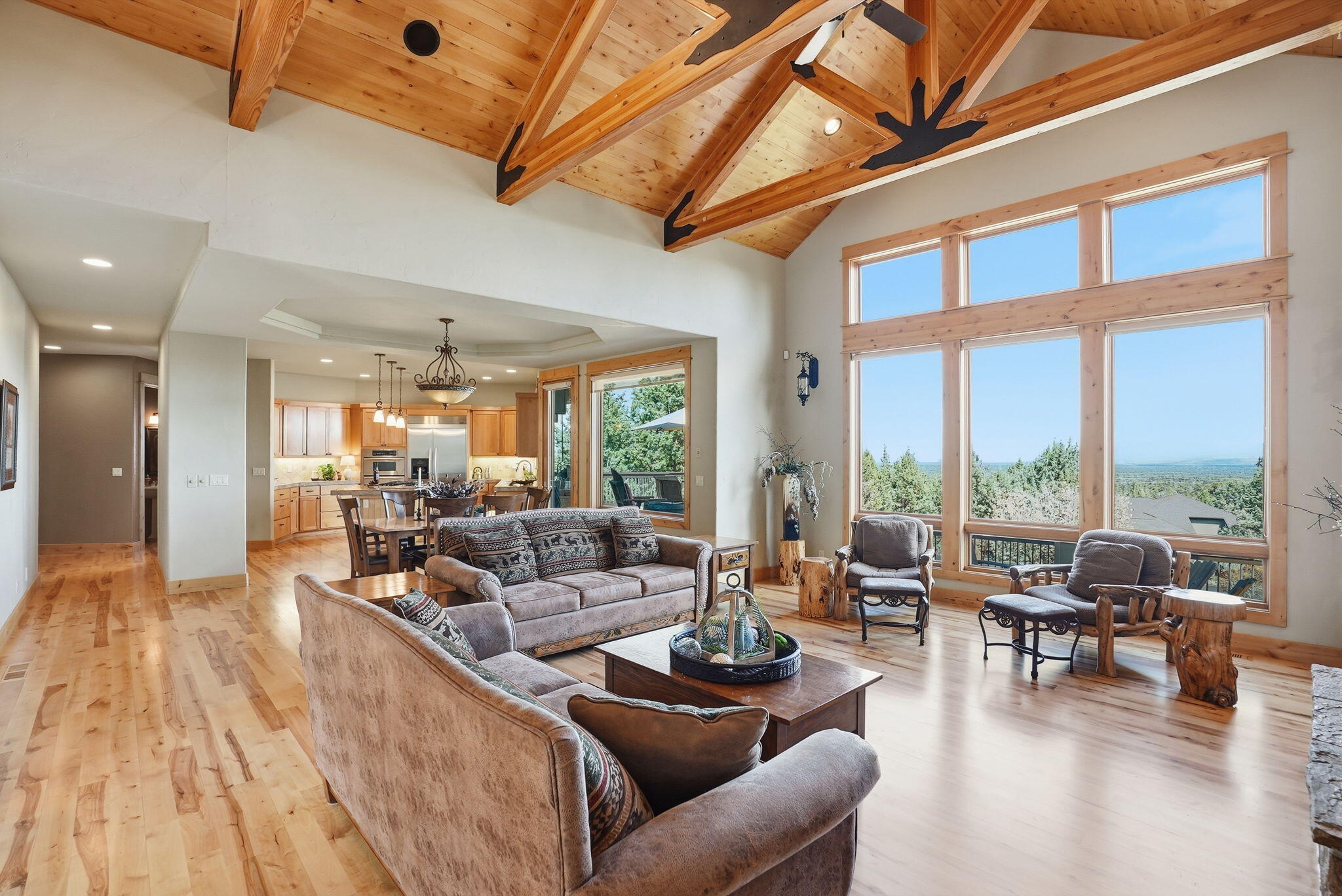 631 Sundance Ridge Court Redmond, OR 97756 - Photo 21 of 61 a living room with furniture and a large window
