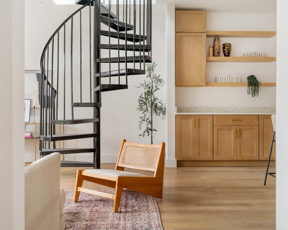 95 Addison Street, Unit PH7 Boston, MA 02128 - Photo 7 of 17 a view of a hallway with seating space