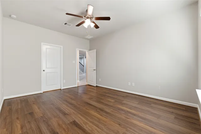 a bathroom with double vanity sink and a mirror