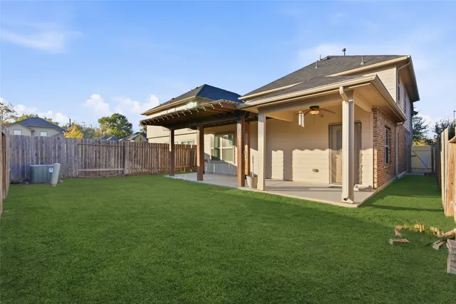 a view of park with large trees