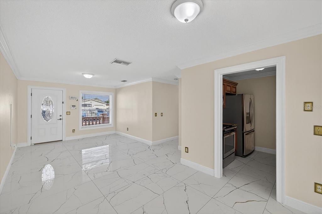2015 Balfour Circle Tampa, FL 33619 - Photo 16 of 42 a view of a hallway with closet