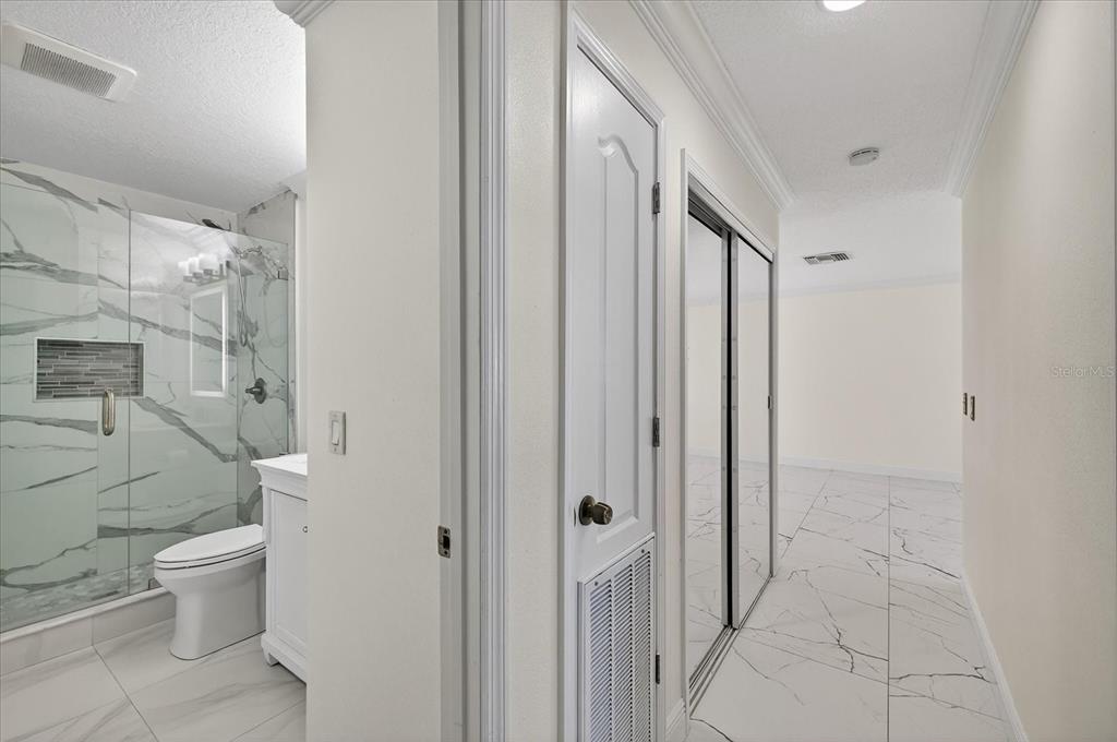 2015 Balfour Circle Tampa, FL 33619 - Photo 23 of 42 a bathroom with a toilet sink and shower