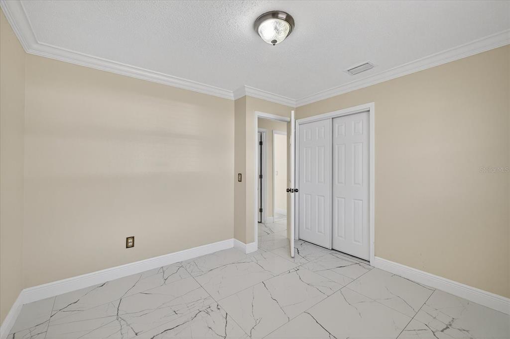 2015 Balfour Circle Tampa, FL 33619 - Photo 29 of 42 a view of an empty room