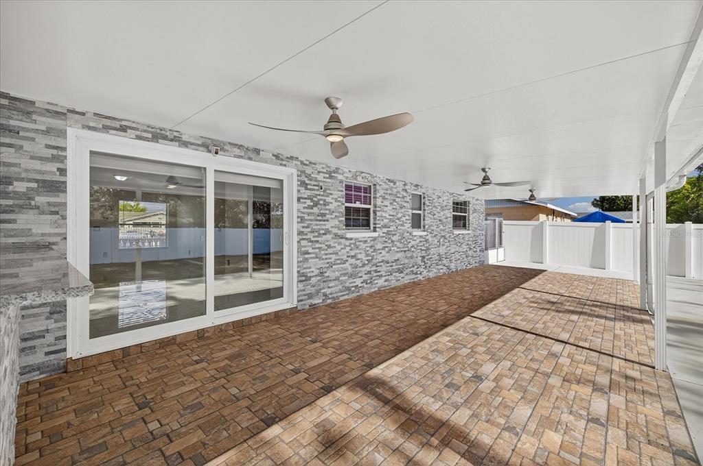 2015 Balfour Circle Tampa, FL 33619 - Photo 36 of 42 a spacious bedroom with a large bed and a large window