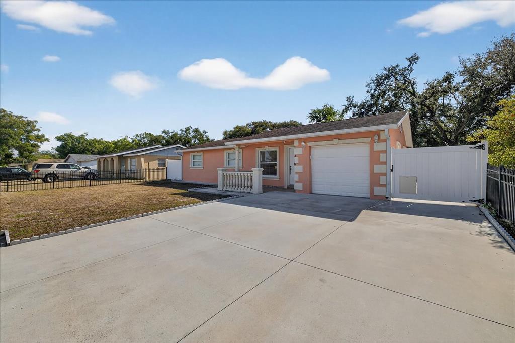 2015 Balfour Circle Tampa, FL 33619 - Photo 7 of 42 front view of house with a street
