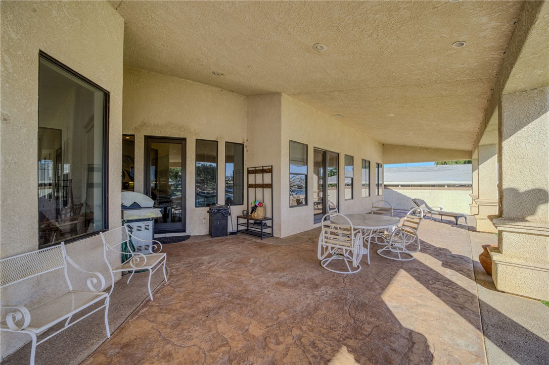 10023 Dike Road Mohave Valley, AZ 86440 - Photo 57 of 100 a living room with furniture and a large window
