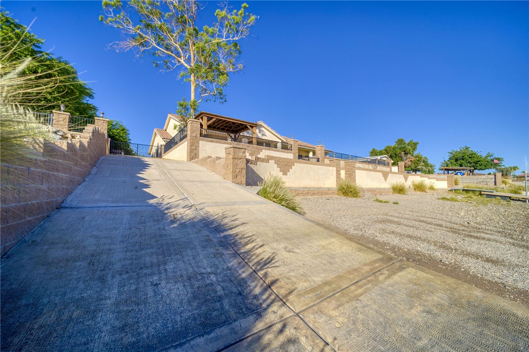 10023 Dike Road Mohave Valley, AZ 86440 - Photo 69 of 100 a view of a house with a yard