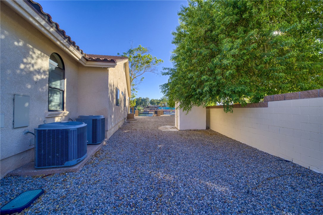 10023 Dike Road Mohave Valley, AZ 86440 - Photo 74 of 100 a view of a house with a backyard
