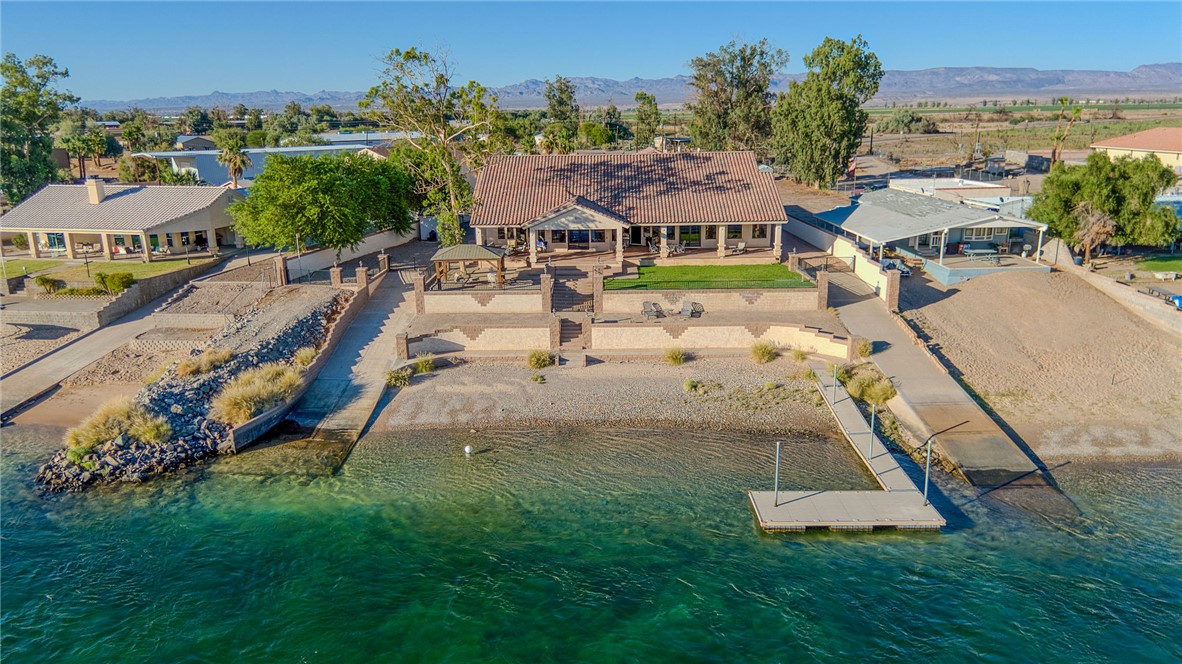 10023 Dike Road Mohave Valley, AZ 86440 - Photo 94 of 100 an aerial view of a house with swimming pool garden and patio