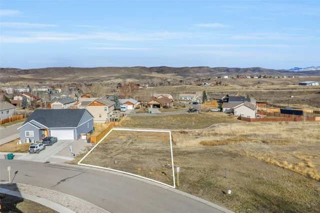 a view of a terrace with wooden floor and city view